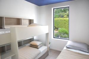 Maisons de vacances Maison Les Chenes - Jacuzzi - Calme & Idealement situe - Clim - Salle de Jeux - Parking : photos des chambres