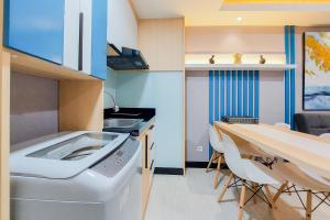 Scenic and Comfortable 2BR Apartment M-Town Residence By Travelio