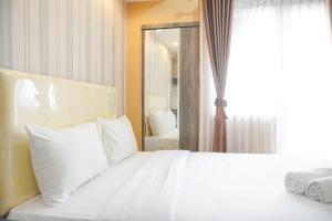 Cozy Stay Studio at Green Pramuka City Apartment By Travelio