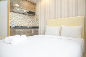 Cozy Stay Studio at Green Pramuka City Apartment By Travelio