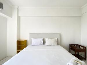 Comfort 2BR at Bona Vista Apartment By Travelio