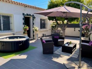 Maisons de vacances Key Largo villa 2p avec pkg clim grande terrasse avec jacuzzi proche port et plage : photos des chambres