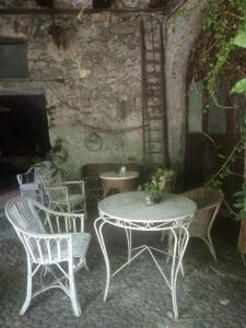 Appartamento in dimora storica con patio fiorito