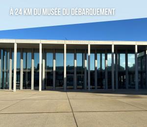Maisons de vacances La brise marine apt rdc maison cour fermee parking et terrasse a 800 m plage Omaha beach avec table de ping pong proche Port en Bessin : photos des chambres