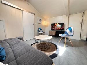 Appartements Cottage Le Rosie au bord du lac avec jacuzzi : photos des chambres
