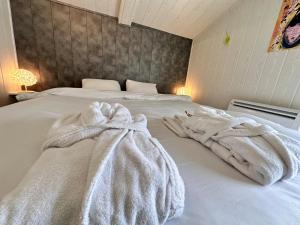 Appartements Cottage Le Rosie au bord du lac avec jacuzzi : photos des chambres