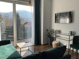 Z Widokiem Apartamenty - apartamenty z widokiem na góry i zewnętrzną balią