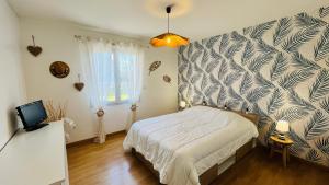 Maisons de vacances Maison proche centre ville, cosy et confort : photos des chambres