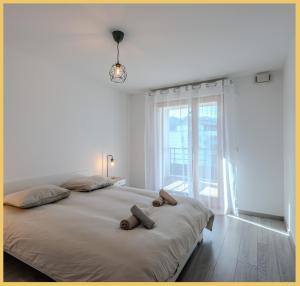 Appartements Le Rivage I T3 Bord du Lac I Publier : photos des chambres