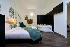Appartements NG Prestige - Balneo - TV - Netflix - WIFI - Cour : photos des chambres