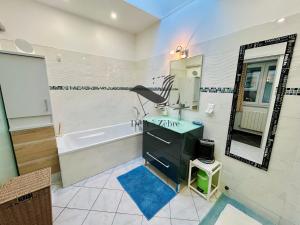 Maisons de vacances Le Ferney - Proche du centre-ville et des thermes : photos des chambres