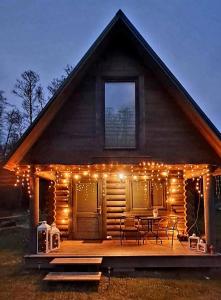 Imantas guļbaļķu namiņš ar pirti - 4hvězdičkové hotely ve městě Salacgrīva