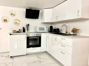Appartements Ti Dous - Terrasse, Jardin, Proche Centre ville : photos des chambres