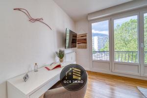 Appartements Le Clemenceau - Stade des alpes - Parking Gratuit : photos des chambres