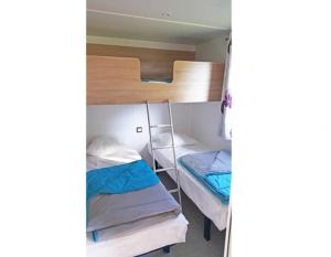 Campings BONNES VACANCES sur le CAMPING LE BOSC : photos des chambres