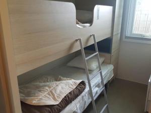 Campings BONNES VACANCES sur le CAMPING LE BOSC : photos des chambres