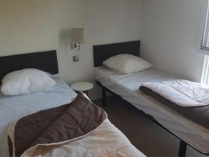 Campings BONNES VACANCES sur le CAMPING LE BOSC : photos des chambres