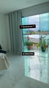 Casa Festival de Parintins 2025 com vista para o Bumbodromo - 帕林廷斯