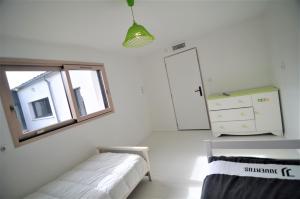 Maisons de vacances Maison Independante Climatisee a Deux Pas des Plages, Confort et Detente Assures : photos des chambres