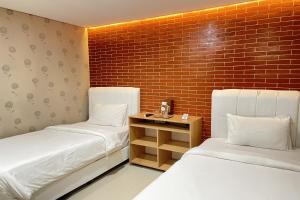 Phòng Hai Giường Đơn Loại Sang (Deluxe Twin Room)