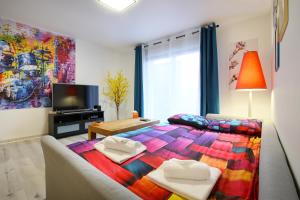 Appartements Vitamine - Services sur-mesure et Parking Gratuit : photos des chambres