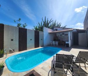 Casa térrea, 3 quartos, piscina, churrasqueira, próximo à Praia das Palmeira