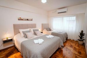 Av Corrientes Confortable depto para familia