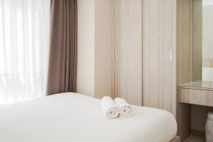 Fully Furnished with Comfortable 3BR Apartment at M-Town Residence By Travelio