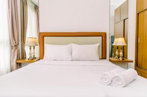 Cozy Living Studio Apartment at Scientia Residence By Travelio