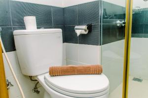 Cozy Living Studio Apartment at Scientia Residence By Travelio