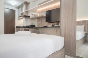 Nice Studio at 11th Floor Transpark Cibubur Apartment By Travelio