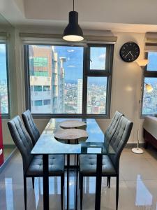 Cozy 1BR Condo in Manila Near US Embassy and Robinsons Place Manila