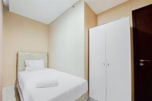 Stunning and Spacious 2BR Brooklyn Alam Sutera Apartment By Travelio