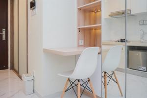 Cozy Stay and Simply Studio at Sky House BSD Apartment By Travelio