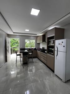 Apartamento aconchegante com estacionamento privado