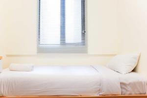 Nice and Comfort 2BR Apartment at Meikarta By Travelio