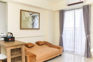 Nice and Comfort 2BR Apartment at Meikarta By Travelio