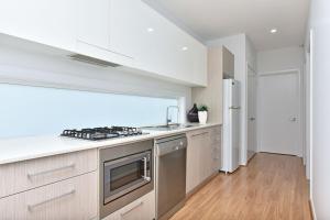 Palm Breeze at Caves Beach Villas sleeps 5