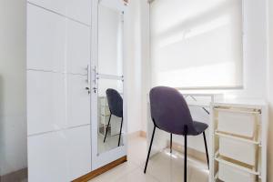 Homey and Warm Studio Room Serpong Garden Apartment By Travelio