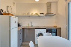 Appartements Le Nicole un appartement en duplex avec balcon et place de parking : photos des chambres