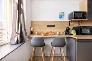 Appartements Le Bras d'or Apparts et Spa : photos des chambres