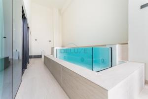 Minutes from Top Shopping and Lifestyle Hubs 2BR with Private Pool, Binghatti Amber, JVC by Deluxe Holiday Homes