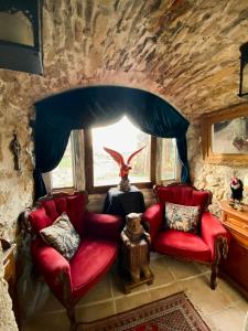 Appartements Le relais magique des sorciers et ses enigmes : photos des chambres