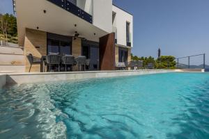 Beachfront villa Mare with seaview and pool