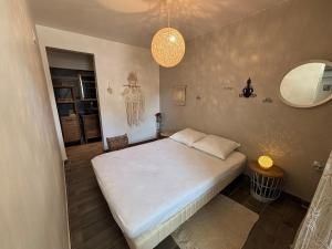 Appartement en rez-de-jardin avec terrasse privative