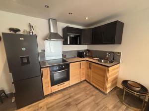 Appartement en rez-de-jardin avec terrasse privative