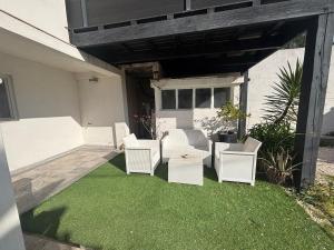 Appartement en rez-de-jardin avec terrasse privative