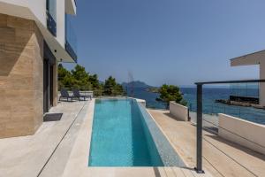 Beachfront villa Luce with seaview and pool