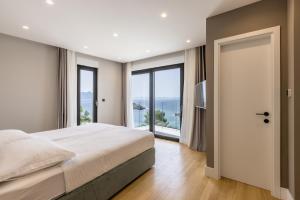 Beachfront villa Luce with seaview and pool