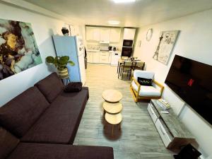 Sejours chez l'habitant Appartement T2 confortable - Piscine et Jacuzzi : photos des chambres